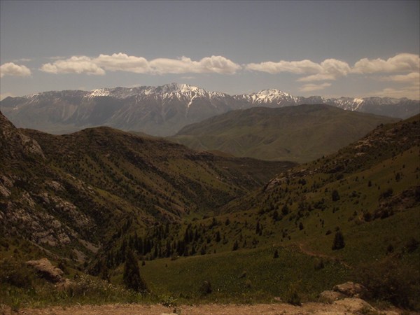 Ak-Shiyrak range. View in the light of biker`s sunglasses